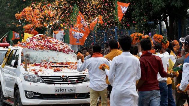 BJPsupporters welcome BJP national president Amit Shah on his arrival in Bhopal for a three-day visit to Madhya Pradesh on Friday. (PTI Photo) BJPsupporters welcome BJP national president Amit Shah on his arrival in Bhopal for a three-day visit to Madhya Pradesh on Friday. (PTI Photo)