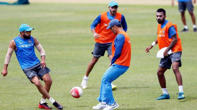 Virat Kohli, MS Dhoni and KL Rahul sum up their practice session with an intense football session. (REUTERS) Virat Kohli, MS Dhoni and KL Rahul sum up their practice session with an intense football session. (REUTERS)