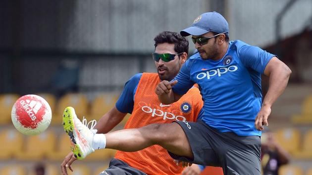 Shardul Thakur plays football with teammate Bhuvneshwar Kumar. The young pacer has been included in the ODI squad. (AFP) Shardul Thakur plays football with teammate Bhuvneshwar Kumar. The young pacer has been included in the ODI squad. (AFP)