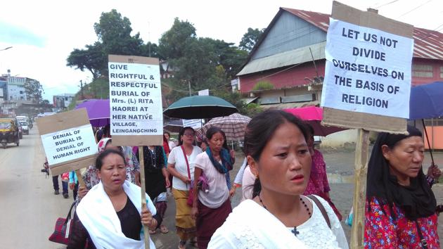 Rally demanding the burial of a 42-year-old woman in Imphal. (HT photo) Rally demanding the burial of a 42-year-old woman in Imphal. (HT photo)
