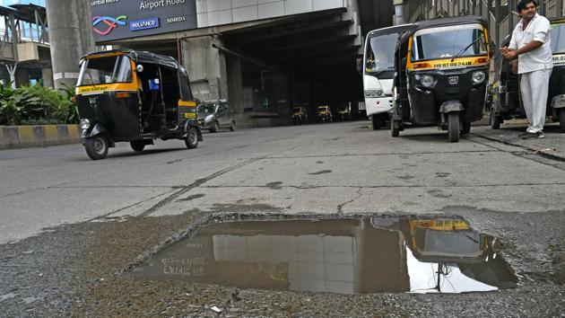 The pothole-ridden road near Airport Road metro station poses a threat to bikers. (Shashi S Kashyap) The pothole-ridden road near Airport Road metro station poses a threat to bikers. (Shashi S Kashyap)