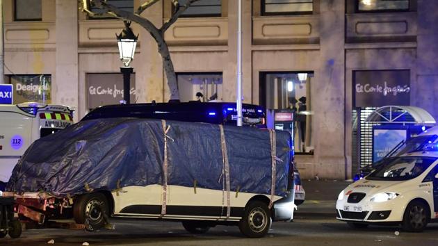 A van weaved onto a promenade and barrelled down a busy walkway in central Barcelona on Thursday, swerving as it mowed down pedestrians. Thirteen people were killed and 100 injured, in what authorities called a terrorist attack. Cars, trucks and vans have been the weapon of choice in multiple extremist attacks in Europe in the last year. (Javier Soriano/AFP)