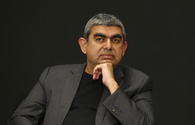 In file photo, Infosys chief executive officer Vishal Sikka listens to a question during a press conference. (AP File Photo) In file photo, Infosys chief executive officer Vishal Sikka listens to a question during a press conference. (AP File Photo)