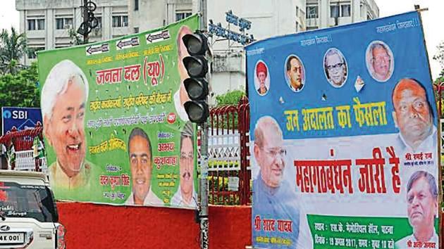 The posters put up by the warring factions of JD(U) at the Income-Tax roundabout in Patna on Friday. (AP Dube/hHTphoto) The posters put up by the warring factions of JD(U) at the Income-Tax roundabout in Patna on Friday. (AP Dube/hHTphoto)