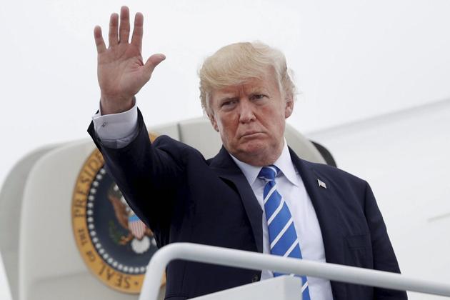 Donald Trump boards Air Force One at Hagerstown Regional Airport in Hagerstown, Maryland on August 18, 2017, after a national security meeting at Camp David. (AP) Donald Trump boards Air Force One at Hagerstown Regional Airport in Hagerstown, Maryland on August 18, 2017, after a national security meeting at Camp David. (AP)