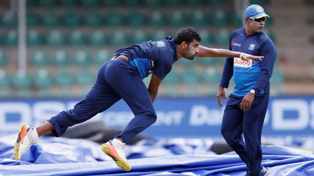 Sri Lanka's Thisara Perera bowls next to coach Chaminda Vaas ahead of their first ODI vs India. (Reuters) Sri Lanka's Thisara Perera bowls next to coach Chaminda Vaas ahead of their first ODI vs India. (Reuters)