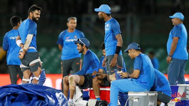 India captain Virat Kohli shares a moment with teammate MS Dhoni and other members ahead of the 1st ODI in Dambulla against Sri Lanka. (REUTERS) India captain Virat Kohli shares a moment with teammate MS Dhoni and other members ahead of the 1st ODI in Dambulla against Sri Lanka. (REUTERS)
