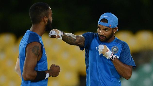 Opener Shikhar Dhawan (R) shares a light moment with teammate Lokesh Rahul during the practice session. (AFP) Opener Shikhar Dhawan (R) shares a light moment with teammate Lokesh Rahul during the practice session. (AFP)