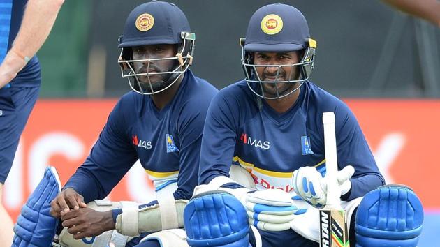 Upul Tharanga (R) and Angelo Mathews watch other players during the session in Dambulla. (AFP) Upul Tharanga (R) and Angelo Mathews watch other players during the session in Dambulla. (AFP)