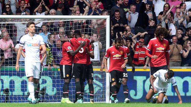 Swansea City's Kyle Naughton looks dejected after Manchester United's Romelu Lukaku scored their second goal in the Premier League on Saturday. (Reuters) Swansea City's Kyle Naughton looks dejected after Manchester United's Romelu Lukaku scored their second goal in the Premier League on Saturday. (Reuters)