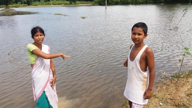 The younger brother and the aunt of the victim show the spot where the teenager drowned on Thursday. (Utpal Parashar) The younger brother and the aunt of the victim show the spot where the teenager drowned on Thursday. (Utpal Parashar)