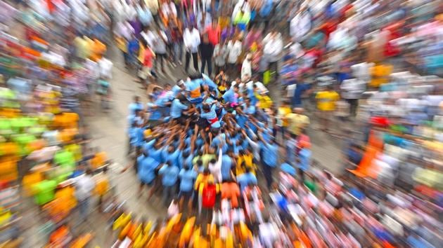 Govinda's form a human pyramid to break the Dahi handi at Ghatkopar in Mumbai. (Pratik Chorge/HT Photo)