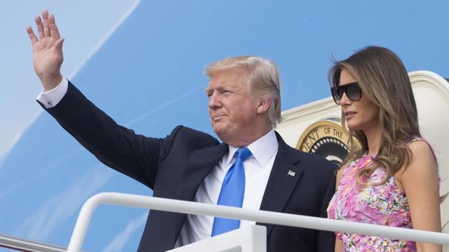 US President Donald Trump and First Lady Melania Trump board Air Force One in Maryland. (AFP file) US President Donald Trump and First Lady Melania Trump board Air Force One in Maryland. (AFP file)