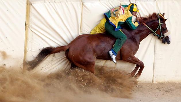 Jockey Luigi Bruschelli crashes during the Palio of Siena horse race. (Stefano Rellandini/REUTERS)