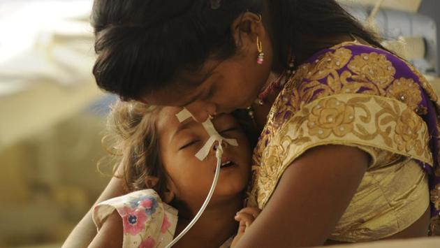 A scene inside encephalitis ward at BRD medical centre in Gorakhpur, on Tuesday. (Deepak Gupta/HT PHOTO)
