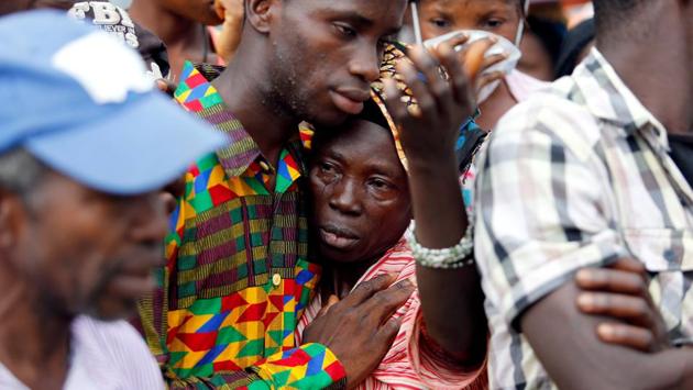 A mother who lost her son during the mudslide gets consoled by a sympathiser near the entrance of Connaught Hospital in Freetown, Sierra Leone August 16, 2017. (Afolabi Sotunde/REUTERS)