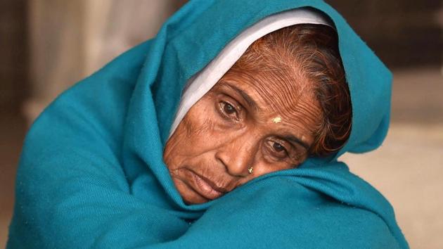 A survivor of the Utkal Express train derailment sits at a temple in Khatauli near Muzaffarnagar on Sunday. (PTI) A survivor of the Utkal Express train derailment sits at a temple in Khatauli near Muzaffarnagar on Sunday. (PTI)