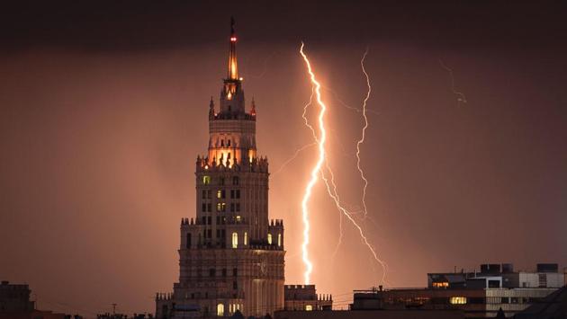 A lightning bolt striking a Stalin era skyscraper during a storm over Moscow. (Mladen Antonov/AFP)