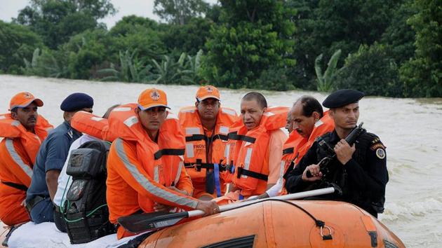 Uttar Pradesh chief minister Yogi Adityanath inspects the flood-affected areas in Gorakhpur on Saturday. (PTI Photo) Uttar Pradesh chief minister Yogi Adityanath inspects the flood-affected areas in Gorakhpur on Saturday. (PTI Photo)
