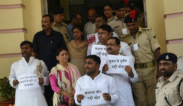 Former chief minister Rabri Devi staging a dharna with other RJD members in the portico of the Bihar legislative council on Monday. (Santosh Kumar/HT photo) Former chief minister Rabri Devi staging a dharna with other RJD members in the portico of the Bihar legislative council on Monday. (Santosh Kumar/HT photo)