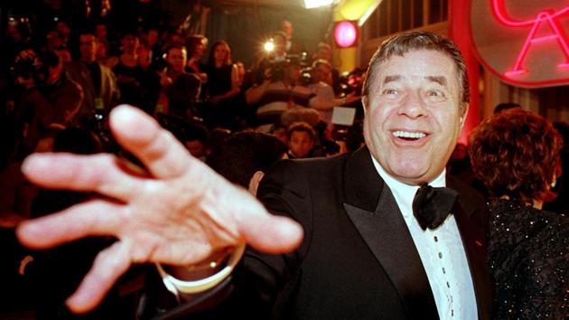 Comedian Jerry Lewis reaches out to cover the camera lens as he arrives at the 12th annual American Comedy Awards in February 1998 in Los Angeles where he was honoured with the Lifetime Achievement Award. (Reuters) Comedian Jerry Lewis reaches out to cover the camera lens as he arrives at the 12th annual American Comedy Awards in February 1998 in Los Angeles where he was honoured with the Lifetime Achievement Award. (Reuters)