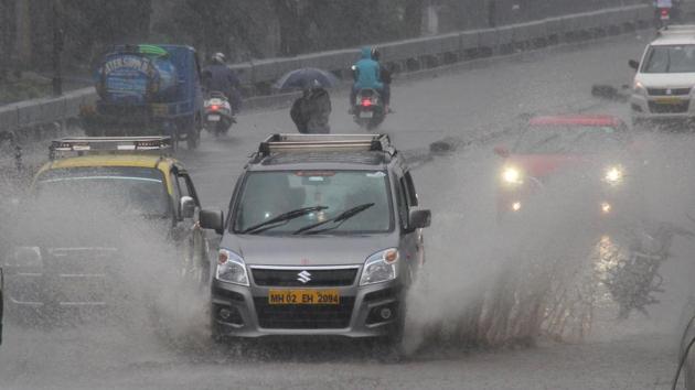 Mumbai, India - 20 Aug. 2017: Waterlogged at Hindmata during heavy rainfall, in Mumbai, India, on Sunday, Aug 20, 2017. (Photo by Bhushan Koyande/HT) Mumbai, India - 20 Aug. 2017: Waterlogged at Hindmata during heavy rainfall, in Mumbai, India, on Sunday, Aug 20, 2017. (Photo by Bhushan Koyande/HT)