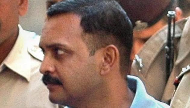 Malegaon blast case accused Lt Col Shrikant Prasad Purohit being taken to a session court in Mumbai.(PTI)