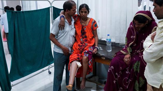 A man helps his wife to walk for the first time with her first rubber-based prosthetic leg in Jaipur, Rajasthan. The indigenous product’s mobility also accommodates everyday tasks such as working in fields, sitting cross-legged or using Indian style squat toilets without the need for modifications or removal. (Chandan Khanna / AFP)