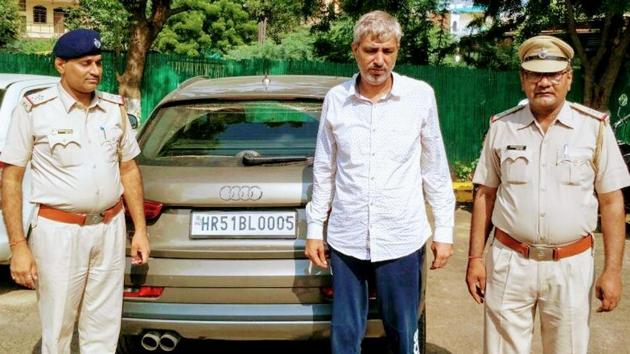 Manish, who is the prime accused in the fake arms licence racket, had complained to the Sector 5 police station on August 1 that a group of gangsters led by Manjeet Mahal had forced him to hand over around Rs 10 lakh and the Audi to ensure his safety in Bhondsi jail. (HT Photo) Manish, who is the prime accused in the fake arms licence racket, had complained to the Sector 5 police station on August 1 that a group of gangsters led by Manjeet Mahal had forced him to hand over around Rs 10 lakh and the Audi to ensure his safety in Bhondsi jail. (HT Photo)