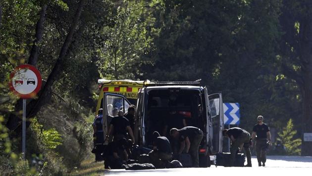 Members of TEDAX-NRBQ (Technician Specialist in Deactivation of Explosive Artifacts) on the site where Moroccan suspect Younes Abouyaaqoub was shot on August 21, 2017 near Sant Sadurni d'Anoia, south of Barcelona, four days after the Barcelona and Cambrils attacks that killed 15 people.(AFP) Members of TEDAX-NRBQ (Technician Specialist in Deactivation of Explosive Artifacts) on the site where Moroccan suspect Younes Abouyaaqoub was shot on August 21, 2017 near Sant Sadurni d'Anoia, south of Barcelona, four days after the Barcelona and Cambrils attacks that killed 15 people.(AFP)