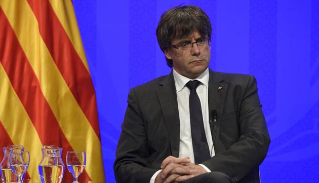 President of Catalonia Carles Puigdemont looks on during a press conference at the Generalitat (Catalan Government) in Barcelona on August 20, 2017. Police said they had cast a dragnet for 22-year-old Younes Abouyaaqoub, who media reports say was the driver of a van that smashed into people on Barcelona's busy Las Ramblas boulevard on August 17, killing 13.(AFP)