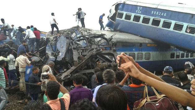 Railway police and local volunteers look for survivors in the upturned coaches of the Kalinga-Utkal Express after an accident near Khatauli, Uttar Pradesh on August 20 . (AP Photo) Railway police and local volunteers look for survivors in the upturned coaches of the Kalinga-Utkal Express after an accident near Khatauli, Uttar Pradesh on August 20 . (AP Photo)