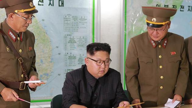 This picture taken on August 14, 2017 and released from North Korea's official Korean Central News Agency (KCNA) on August 15, 2017 shows North Korean leader Kim Jong-Un (C) inspecting the Command of the Strategic Force of the Korean People's Army (KPA) at an undisclosed location. (AFP) This picture taken on August 14, 2017 and released from North Korea's official Korean Central News Agency (KCNA) on August 15, 2017 shows North Korean leader Kim Jong-Un (C) inspecting the Command of the Strategic Force of the Korean People's Army (KPA) at an undisclosed location. (AFP)