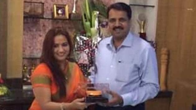 Narendra Mehta with his wife during her birthday when he gifted her a Lamborghin. Narendra Mehta with his wife during her birthday when he gifted her a Lamborghin.