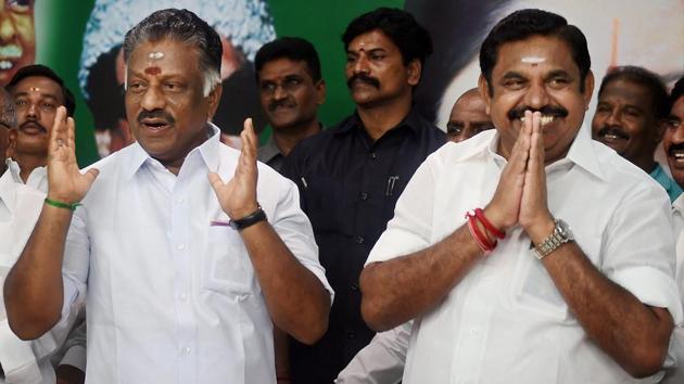 Tamil Nadu Chief Minister K Palaniswami and O Panneerselvam exchange greetings with supporters following merger of their factions in Chennai on Monday. (PTI) Tamil Nadu Chief Minister K Palaniswami and O Panneerselvam exchange greetings with supporters following merger of their factions in Chennai on Monday. (PTI)