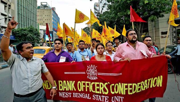 Bank employees participate in a rally in support of their nationwide strike, in Kolkata on Monday. (PTI) Bank employees participate in a rally in support of their nationwide strike, in Kolkata on Monday. (PTI)