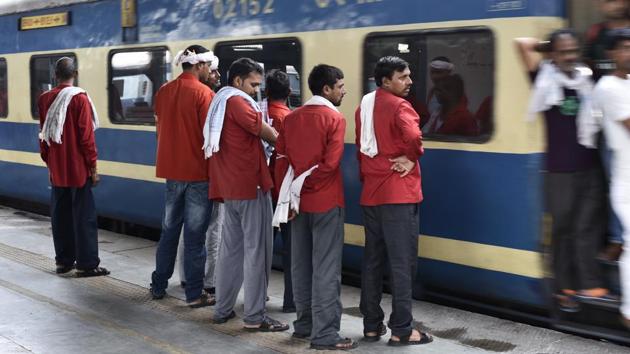 The coolies were renamed in 2016 as ‘sahayaks’ by Minister of Railways Suresh Prabhu, in a move to shed the negative colonial connotations of the term. The rebranding however has brought no change in their work or condition. Advertising their services, the coolie was once the first interaction a passenger had at the railway station. Advancements such as wheeled suitcases and escalators at stations now cause most railway passengers to simply ignore their calls. (Burhaan Kinu / HT Photo)