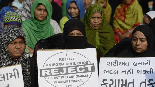 Muslim women at a rally to oppose the Uniform Civil Code (UCC) that would outlaw the practice of triple talaq, in Ahmedabad.(AFP File Photo) Muslim women at a rally to oppose the Uniform Civil Code (UCC) that would outlaw the practice of triple talaq, in Ahmedabad.(AFP File Photo)