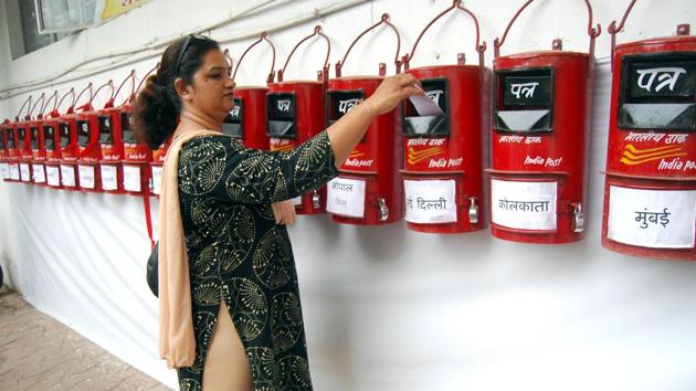 n this picture, a woman is seen posting a rakhi at outside GPO in Indore. (Arun Mondhe/HT File Photo) n this picture, a woman is seen posting a rakhi at outside GPO in Indore. (Arun Mondhe/HT File Photo)
