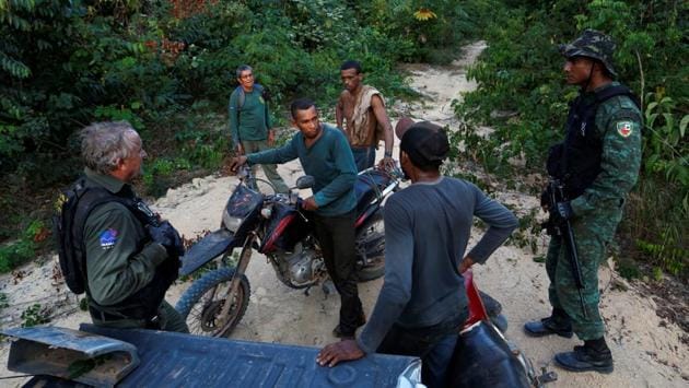 At their best the environmental agents can slow but cannot stop the destruction.The agents raid illegal logging camps, levy large fines that are rarely collected and confiscate chainsaws to temporarily impede the cutting. As soon as agents arrive at camps, the loggers disappear by running into the forest. (Bruno Kelly/REUTERS)