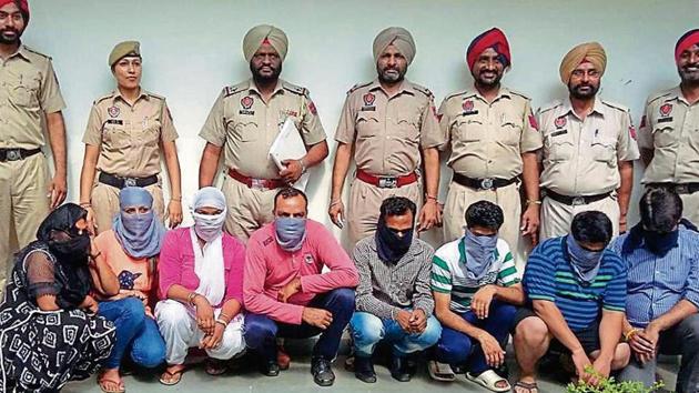 The accused in police custody in Ludhiana on Tuesday. (HT Photo) The accused in police custody in Ludhiana on Tuesday. (HT Photo)