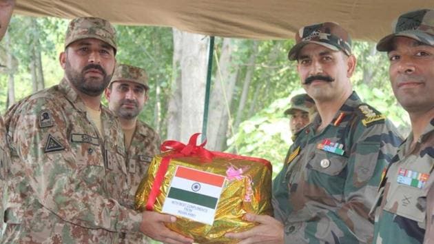 Indian and Pakistan Army officials during a battalion commander-level flag meeting at Chakan-da-Bagh on LoC in Poonch district on Wednesday. (HT) Indian and Pakistan Army officials during a battalion commander-level flag meeting at Chakan-da-Bagh on LoC in Poonch district on Wednesday. (HT)