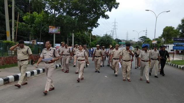 The Chandigarh administration has decided to convert the Sector-16 cricket stadium into a temporary jail for a day. A senior UT officer said orders have been issued to police to convert the stadium into jail on August 25, where at least 10,000 people can be kept if laws aren’t upheld. Police stopped several vehicles at the Zirakpur main chowk, but could not stop followers walking towards the city. (Ravi Kumar / HT Photo)