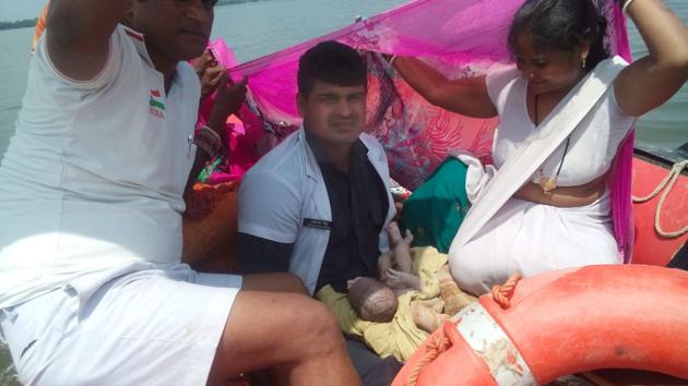 NRDF personnel facilitated child delivery midstream in Bihar’s flood-hit East Champaran district on Wednesday. (Photo courtesy: NDRF) NRDF personnel facilitated child delivery midstream in Bihar’s flood-hit East Champaran district on Wednesday. (Photo courtesy: NDRF)