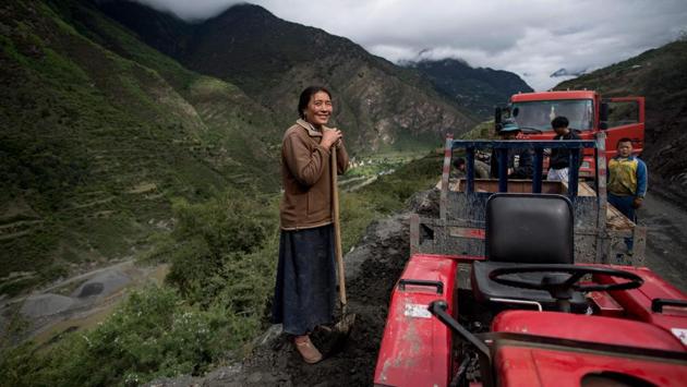 The new policy meant heavy fines for babies born without legal fathers, forcing Zhaba people to obtain government marriage certificates and identify -- on paper at least, a single partner as a spouse. According to anthropologist Feng Min the policy introduced an idea of ‘people as possessions’ which has resulted in rise in notions of jealousy, an emotion once rarely expressed. (Johannes Eisele/AFP)
