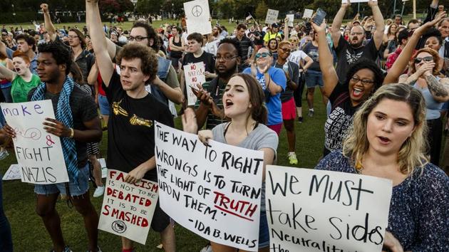 Demonstrators shout during a rally in Coolidge Park on Thursday in Tennessee, US. Organizers said the purpose was to declare resistance against Nazism.(AP file)