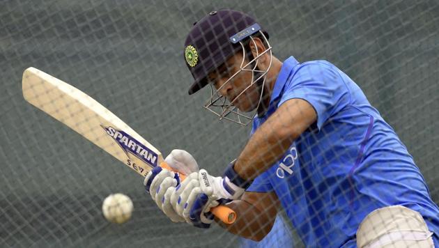 Mahendra Singh Dhoni bats during a practice session at the Pallekele International Cricket Stadium. The second ODI between India and Sri Lanka will take place on August 24. (AFP)