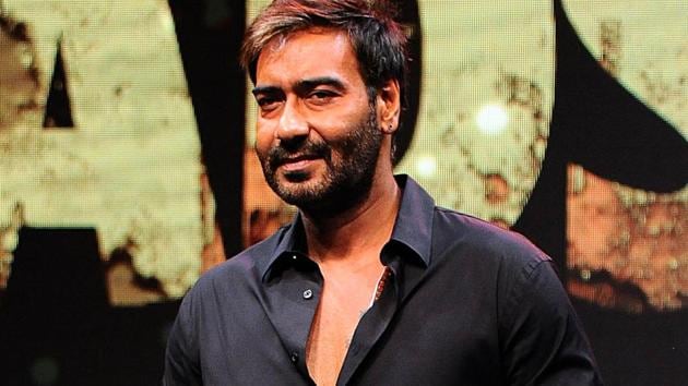 Ajay Devgn poses for pictures during the trailer launch of Baadshaho.(AFP)