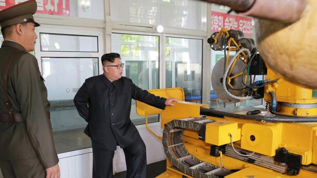 In this undated photo distributed Wednesday, Aug. 23, 2017, by the North Korean government, leader Kim Jong Un, center, visits the Chemical Material Institute of Academy of Defense Science at an undisclosed location in North Korea. (AP Photo) In this undated photo distributed Wednesday, Aug. 23, 2017, by the North Korean government, leader Kim Jong Un, center, visits the Chemical Material Institute of Academy of Defense Science at an undisclosed location in North Korea. (AP Photo)