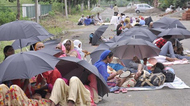 Dera Sacha Sauda followers in Panchkula’s Naam Charcha Ghar on Tuesday. (Sant Arora/HT)